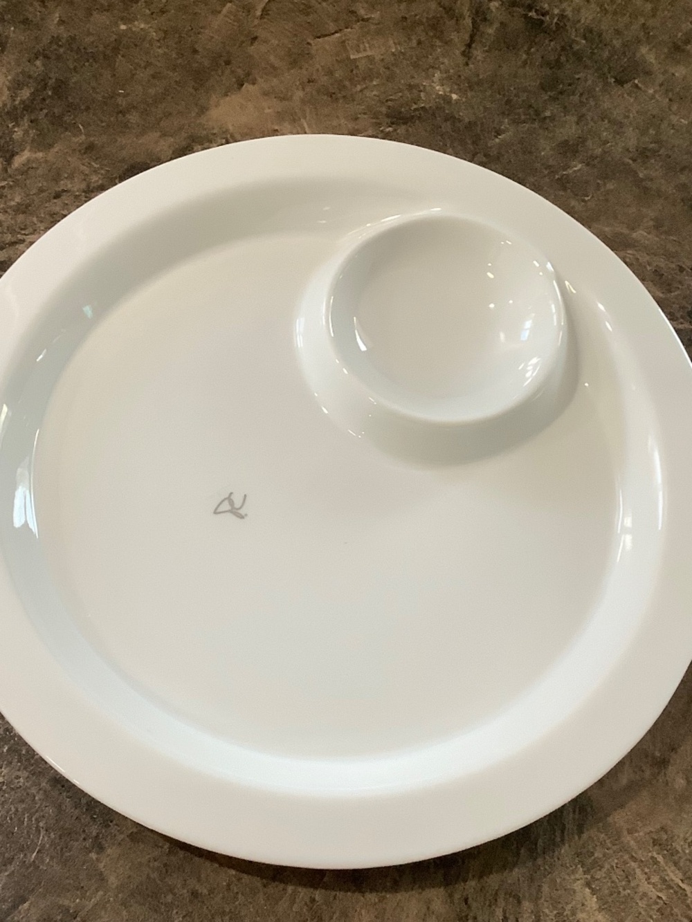 Serving platter with dip bowl built in